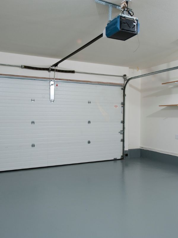 The opener guides the door up and down once the system is balanced correctly.